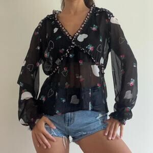 Semi sheer blouse long sleeved medium